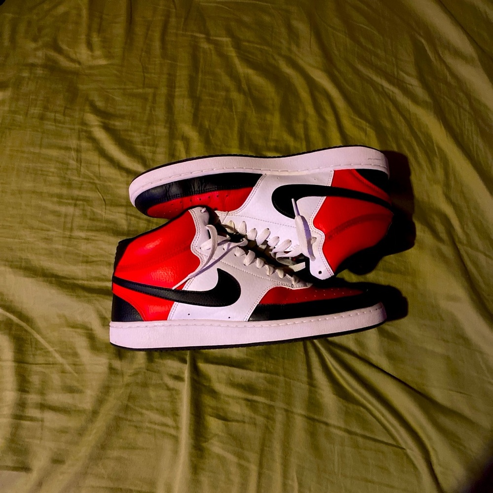 Nike Court Vision Mids! They are laced up and really comfy shoes! Good shoes!